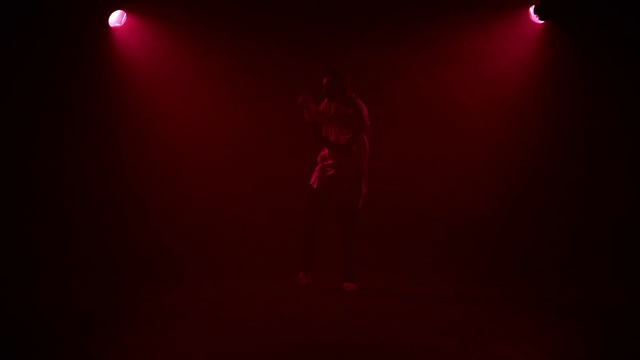 Video Reference: Automotive lighting, Standing, Artist, Microphone, Music, Entertainment, Visual effect lighting, Performing arts, Lens flare, Magenta