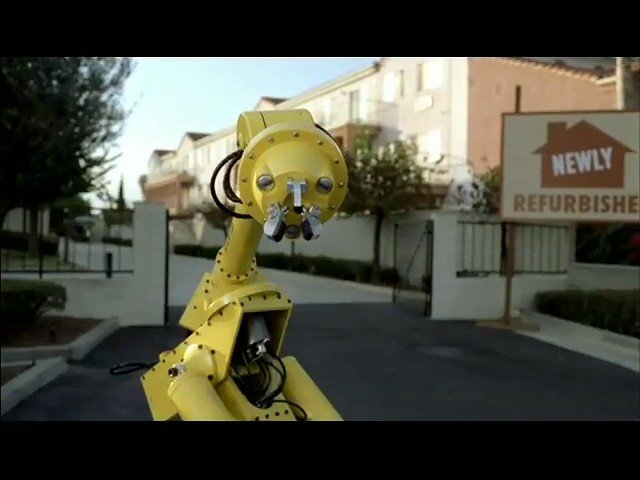 Video Reference: robot, robot arm, industrial, yellow, outdoor, street, residential, machine, automation, technology, housing, sign, daylight