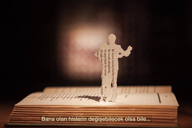 Video Reference: Wood, Font, Art, Book, Event, Religious item, Cross, Entertainment, Trophy, Rectangle