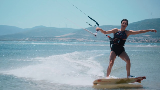 Video Reference: Water, Sky, Sports equipment, Surfing, Surfboard, Leg, Human body, Beach, Outdoor recreation, Surfing Equipment