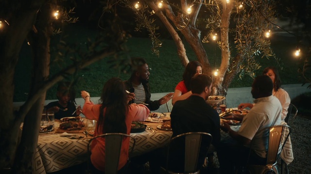 Video Reference: Furniture, Table, Chair, Human, Lighting, Tree, Interaction, Tableware, Social group, Leisure