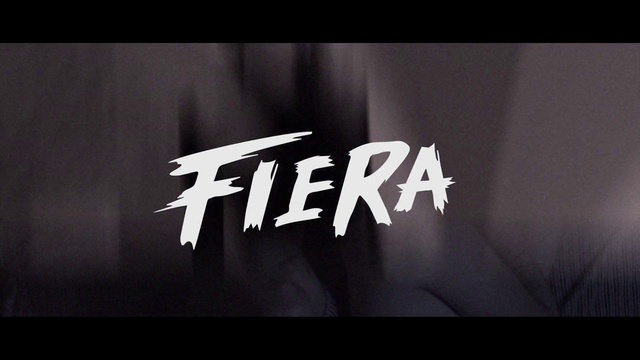 Video Reference: Sleeve, Font, Flash photography, Automotive design, Electric blue, Darkness, Sky, Brand, Logo, Monochrome photography