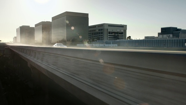 Video Reference: Sky, Building, Cloud, Skyscraper, Tower block, Urban design, Road surface, City, Cityscape, Road