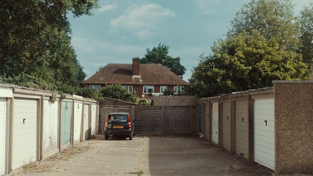 Video Reference: Cloud, Building, Sky, Vehicle, Plant, Vehicle registration plate, Car, Window, Road surface, Tree