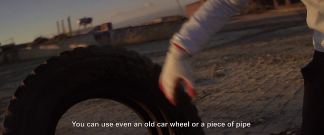 Video Reference: Tire, Automotive tire, Wheel, Tread, Gesture, Synthetic rubber, Asphalt, Landscape, Human leg, Rim