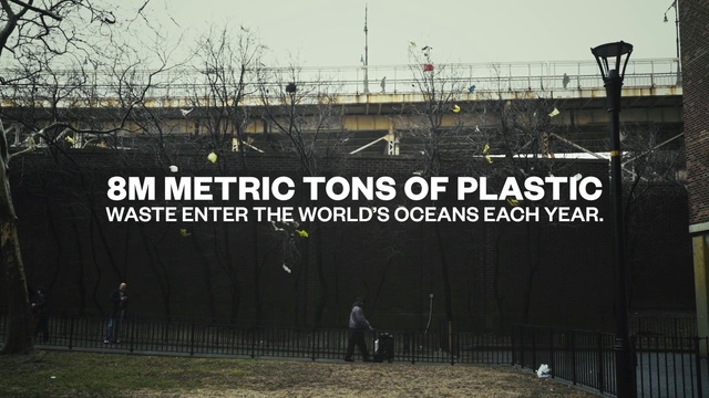 Video Reference: Sky, Font, Landmark, Grass, City, Landscape, Signage, Urban area, Road, Team