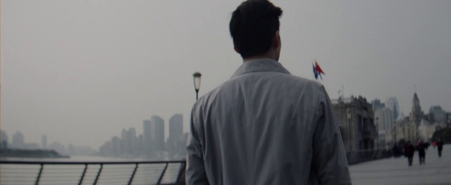 Video Reference: Sky, Water, Dress shirt, Sleeve, Gesture, Grey, Travel, Flag, Event, Street fashion