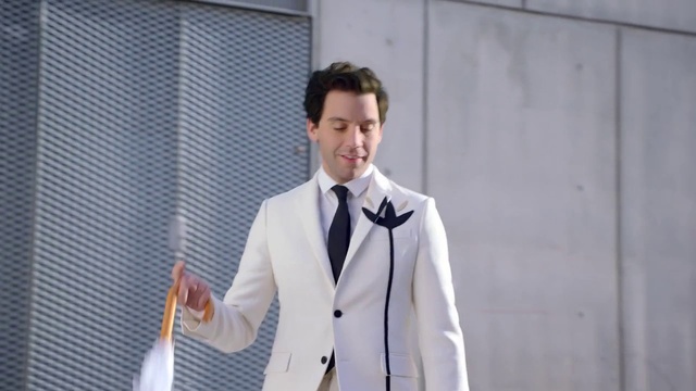 Video Reference: Dress shirt, Sleeve, Collar, Smile, Suit, Street fashion, Fashion design, Blazer, Formal wear, Tie