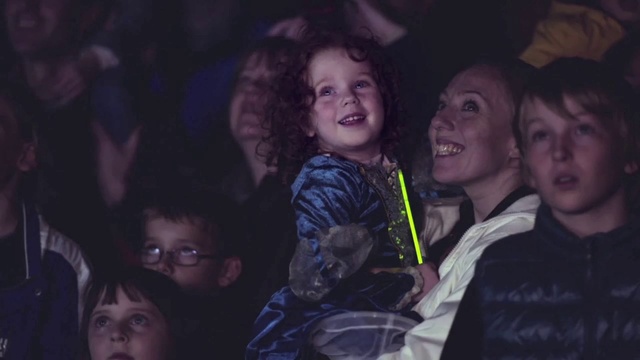 Video Reference: Face, Head, Smile, Eye, Organ, Purple, Flash photography, Ear, Iris, Happy