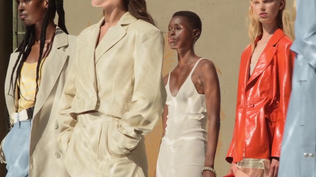 Video Reference: Hair, Shoulder, Tableware, Neck, Street fashion, Sleeve, Waist, Gesture, Fashion design, Formal wear