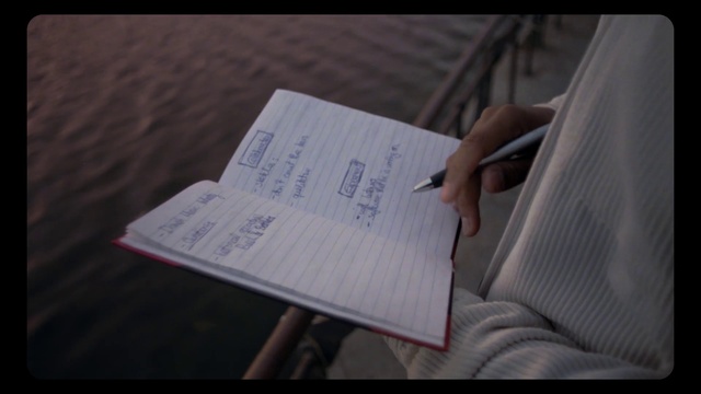 Video Reference: Handwriting, Gesture, Finger, Font, Nail, Comfort, Magenta, Event, Darkness, Writing