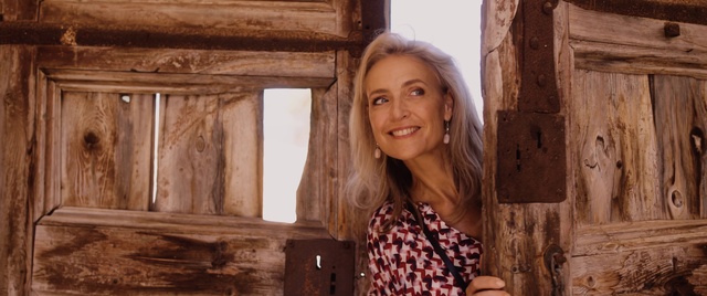 Video Reference: Smile, Chin, Hairstyle, Photograph, Facial expression, Human, Flash photography, Fashion, Wood, Textile