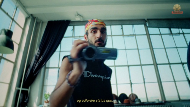 Video Reference: Muscle, Headgear, T-shirt, Curtain, Chest, Beard, Personal protective equipment, Fun, Barechested, Cameras & optics