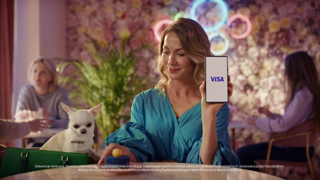 Video Reference: Facial expression, Plant, Smile, Happy, Flash photography, Carnivore, Companion dog, Houseplant, Couch, Leisure