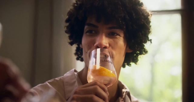 Video Reference: Jheri curl, Drinkware, Drink, Afro, Alcoholic beverage, Ringlet, Drinking, Musician, Tableware, Facial hair