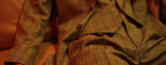 Video Reference: Brown, Outerwear, Tartan, Dress shirt, Textile, Sleeve, Orange, Wood, Plaid, Collar