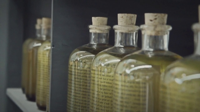 Video Reference: Bottle, Bottle stopper & saver, Glass bottle, Fluid, Alcoholic beverage, Liquid, Drink, Drinkware, Gas, Distilled beverage