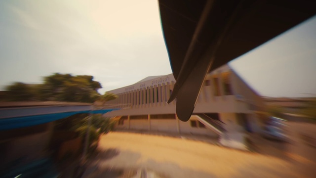 Video Reference: Water, Shade, Building, Wood, Mode of transport, Automotive exterior, Sky, Tree, Automotive lighting, Asphalt