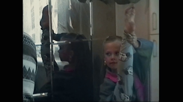 Video Reference: Baby, Toddler, Event, Glass, Room, Vehicle door, Fun, Photo caption, Child, Reflection