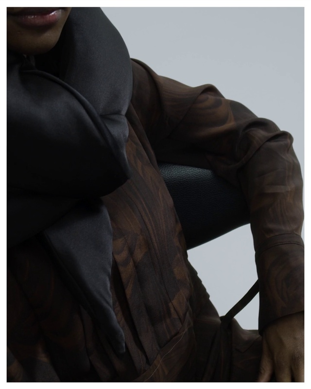 Video Reference: Sky, Sleeve, Gesture, Comfort, Collar, Blazer, Elbow, Human leg, Thigh, Formal wear