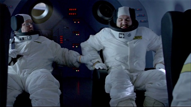 Video Reference: Safety glove, Smile, Astronaut, Glove, Gesture, Helmet, Workwear, Sleeve, Personal protective equipment, Astronomer