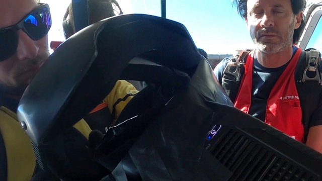 Video Reference: Hood, Vehicle, Motor vehicle, Automotive design, Window, Vehicle door, Automotive tire, Automotive exterior, Personal protective equipment, Sky