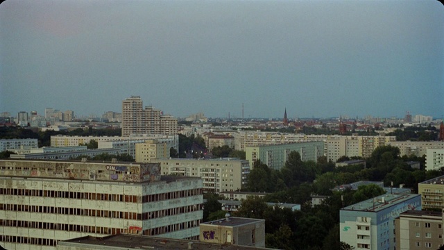 Video Reference: Building, Sky, Window, Tower block, House, Urban design, Tower, Cityscape, Condominium, Neighbourhood