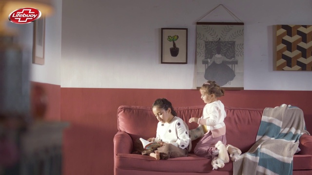 Video Reference: Couch, Furniture, Picture frame, Comfort, Flooring, Toddler, Event, Art, Sitting, studio couch