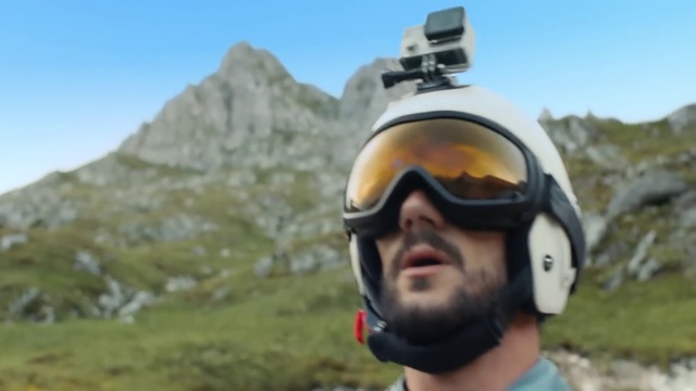 Video Reference: Helmet, Sky, Plant, Mountain, Eyewear, Beard, Headgear, Tree, Travel, Mountainous landforms