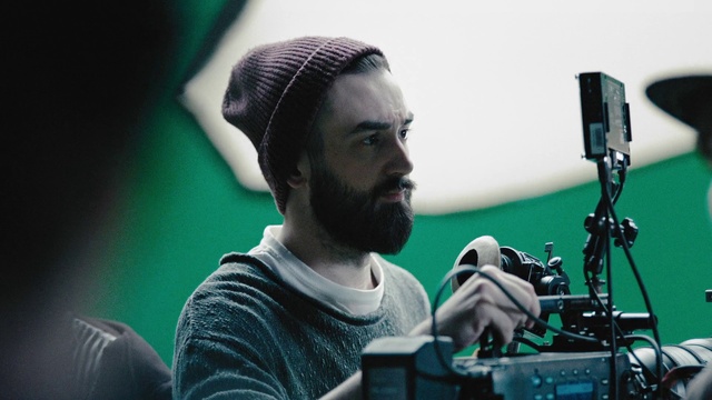 Video Reference: Microphone, Flash photography, Musician, Music, Beard, Videographer, Audio equipment, Music artist, Cap, Entertainment