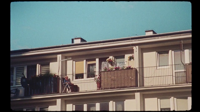 Video Reference: Sky, Window, Building, Wood, Fixture, Plant, Urban design, Facade, Rectangle, Tints and shades