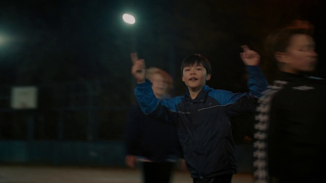 Video Reference: Flash photography, Gesture, Jacket, Fun, Midnight, Event, Darkness, T-shirt, Space, Electric blue
