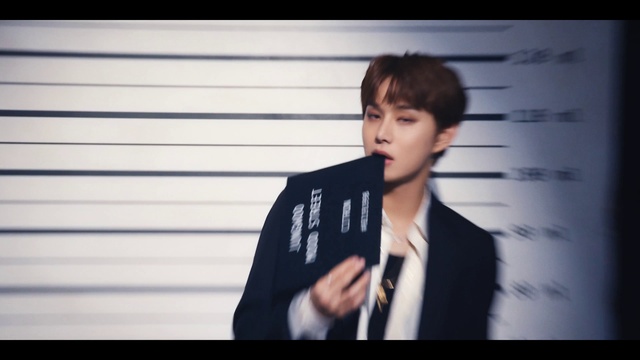 Video Reference: Flash photography, Coat, Gesture, Font, Blazer, Eyelash, Event, Formal wear, Happy, Suit