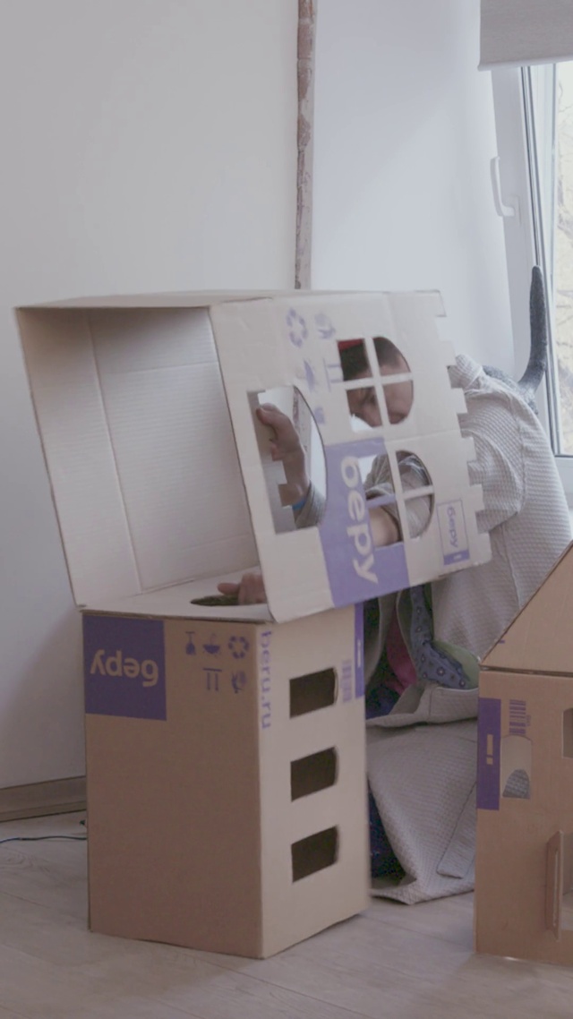 Video Reference: Shipping box, Carton, Gadget, Packaging and labeling, Cardboard, Wood, Space, Box, Font, Plastic