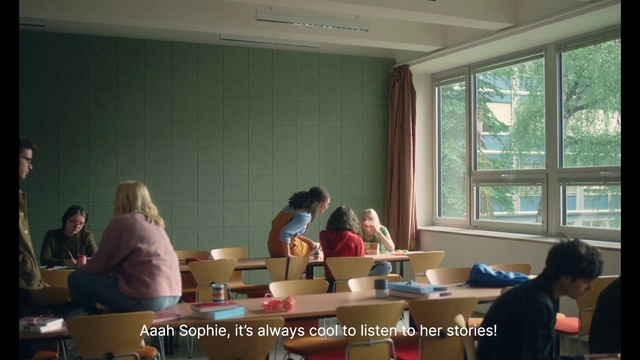 Video Reference: Shirt, Window, Table, Building, Interior design, T-shirt, Chair, Event, Class, Conference hall