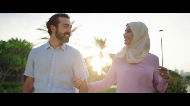 Video Reference: Smile, Flash photography, Plant, Human body, Sleeve, Happy, Standing, People in nature, Gesture, Leisure