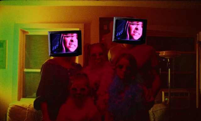 Video Reference: Television, Purple, Hat, Television set, Entertainment, Magenta, Home appliance, Fun, Event, Gadget