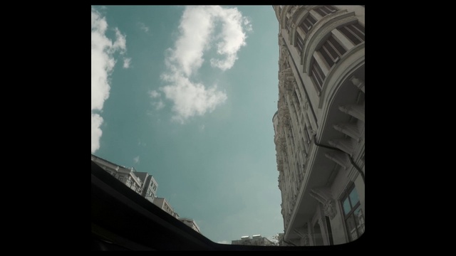 Video Reference: Cloud, Sky, Building, World, Rectangle, Tints and shades, Cumulus, City, Circle, Automotive tire