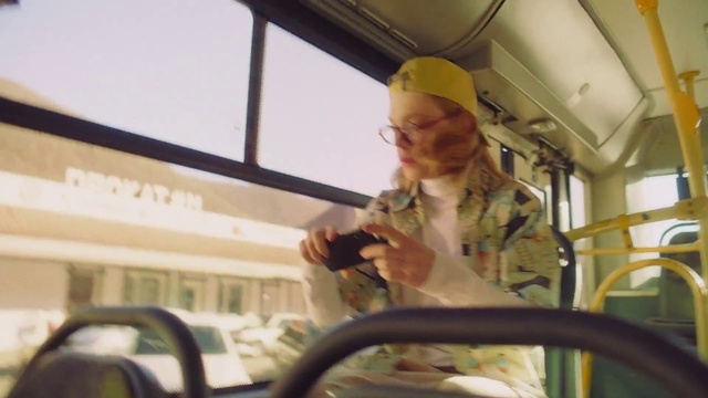 Video Reference: Glasses, Vision care, Eyewear, Vehicle, Cap, Motor vehicle, Public transport, Hat, Steering wheel, Air travel