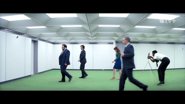 Video Reference: Footwear, Standing, Flooring, Event, Technology, Electric blue, Formal wear, Leisure, Chair, Performing arts