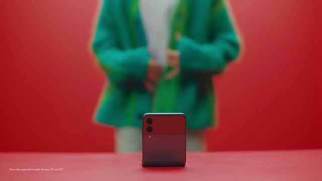 Video Reference: Sleeve, Gesture, Pink, Collar, Jacket, Gadget, Magenta, Communication Device, Blazer, Electric blue