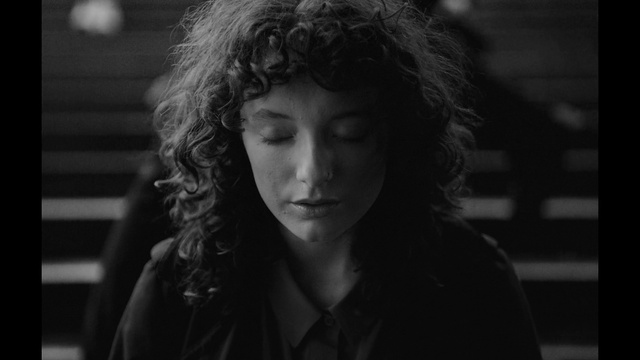 Video Reference: Lip, Chin, Eyebrow, Flash photography, Jaw, Black-and-white, Grey, Style, Street fashion, Black hair