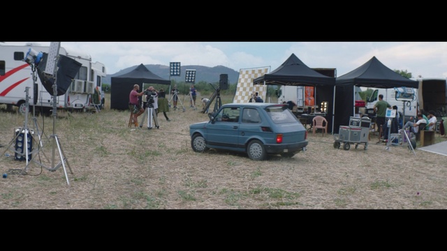 Video Reference: Tire, Wheel, Car, Vehicle, Tent, Motor vehicle, Mode of transport, Sky, Grass, Plant