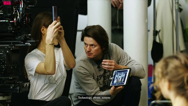 Video Reference: Gesture, Fun, Mobile phone, Tablet computer, Event, Youth, Cameras & optics, T-shirt, Curtain, Gadget