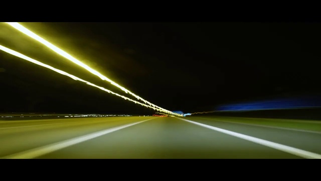 Video Reference: Automotive lighting, Sky, Road surface, Asphalt, Electricity, Thoroughfare, Rectangle, Headlamp, Tints and shades, Horizon