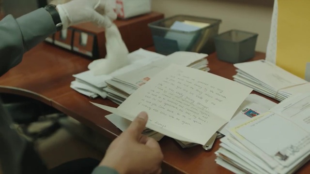 Video Reference: Hand, Table, Gesture, Finger, Office supplies, Office equipment, Desk, Font, Office instrument, Writing