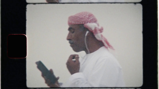 Video Reference: Cap, Gesture, Audio equipment, Magenta, Electronic device, Display device, Technology, Microphone, Art, Event