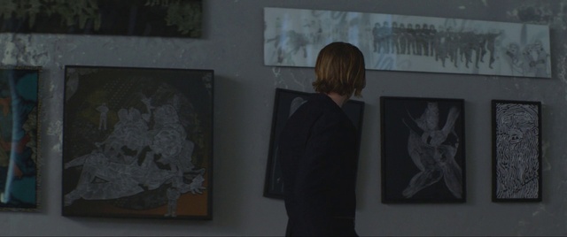 Video Reference: Black, Grey, Art, Wall, Artist, Space, Event, Font, Darkness, Visual arts