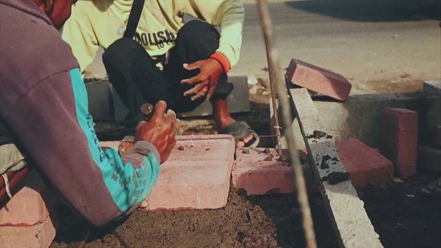 Video Reference: Wood, Leisure, Recreation, Asphalt, Road surface, Soil, Landscape, Grass, T-shirt, Concrete