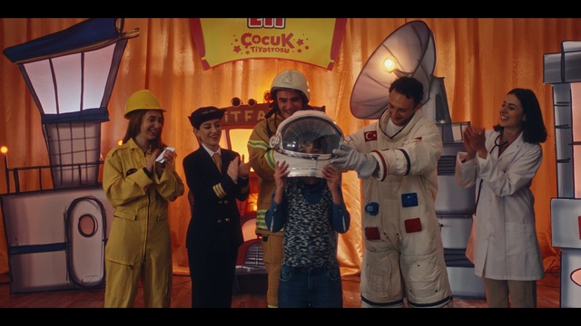 Video Reference: Gesture, Workwear, Entertainment, Helmet, Window, Event, Personal protective equipment, Astronaut, Hat, Job